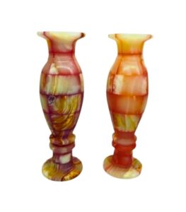 Front view of a handmade pink-orange onyx vase from Egypt