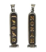 Back side of personalized cartouche pendant showing Ankh symbol engraving