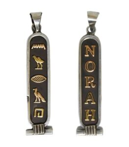 Back side of personalized cartouche pendant showing Ankh symbol engraving