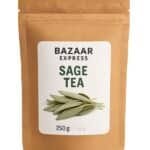 Dried sage leaves on a wooden spoon for tea preparation