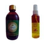 Woman applying Egyptian Magic hair growth oil