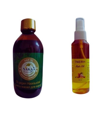 Woman applying Egyptian Magic hair growth oil