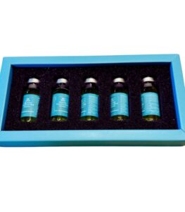 Woman applying hyaluronic acid serum to face
