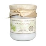 Shea butter cream with lemongrass in glass jar for skin and hair hydration