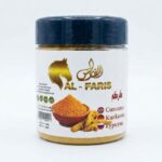 Prestige Curcuma premium turmeric powder jar with fresh curcuma roots and golden spice display
